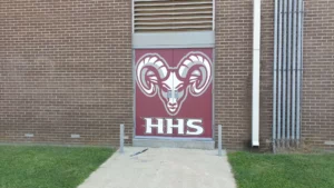 Ram mascot and HHS graphic on maroon school doors