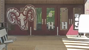 Ram head and H graphics on school entrance doors