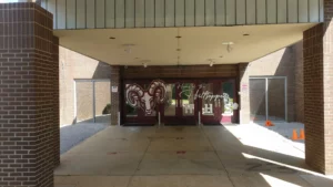 Home of the Hilltoppers ram graphic on school entrance doors